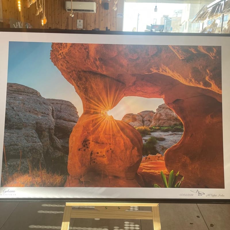 Giclée fine art print of a dramatic natural rock arch at Al Tafileh, Jordan by Ayham Khazendar